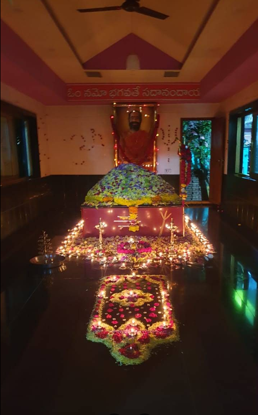 Samadhi Mandir illuminated with lamps and flowers