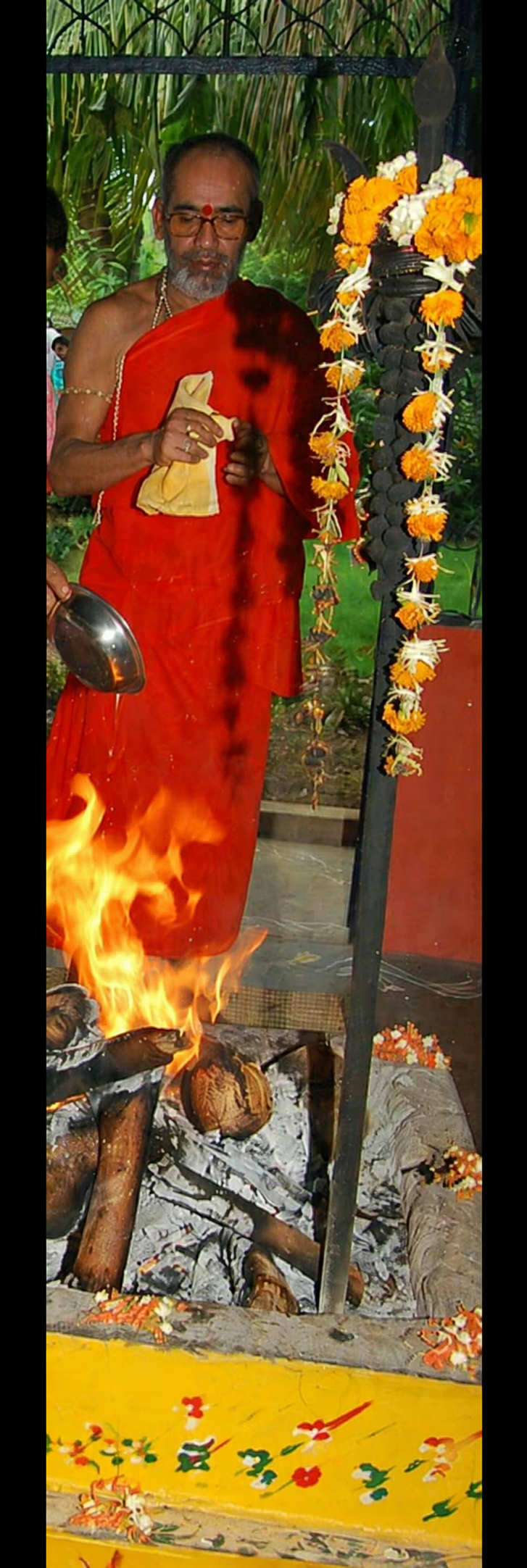 Daily homam being offered at the Yagna Shaala